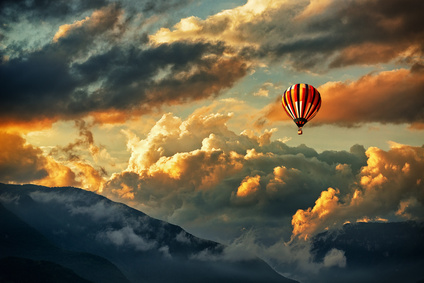 Hot air balloon in a storm clouds